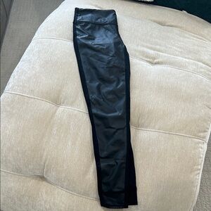 Athleta Black Leggings/ pleather material on front, cotton on the back.